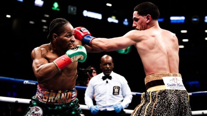 strongShawn Porter (left) overcame an injured left hand to win the WBC’s vacant welterweight crown by unanimous decision over two-division champion Danny Garcia in 2018. (Amanda Westcott/SHOWTIME)/strong