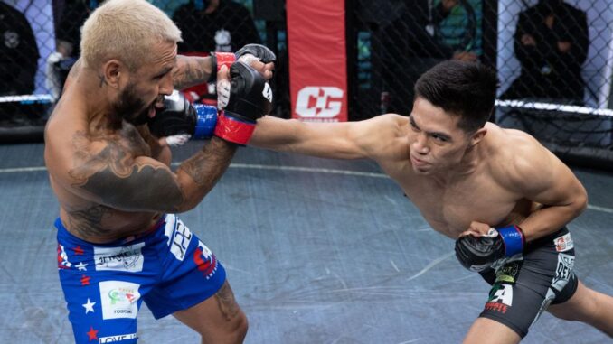 David “The Black Spartan” Martinez (right) and Francisco Rivera Jr. during their fight on May 30, 2021. Martinez won via KO in the second round to take a Combate Global eight-man bantamweight tournament in Miami. (Combate Global)