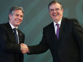 U.S. Secretary of State Antony Blinken (left) and Mexican Foreign Minister Marcelo Ebrard (right) shake hands during a conference as part of the High-Level Security Dialogue at SRE Building on October 8, 2021, in Mexico City. (Photo by Hector Vivas/Getty Images)