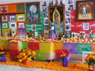 Skulls and marigold (cempasúchil) flowers showcase the Mexica traditions, while the images of virgins and saints highlight the Spanish influence on Day of the Dead. (Héctor Darío Aguirre Arvizu/Zenger)