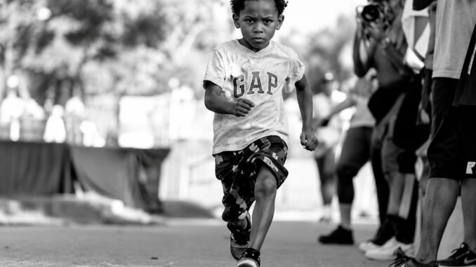 Determined-Boy-Running-Through-the-Cdf